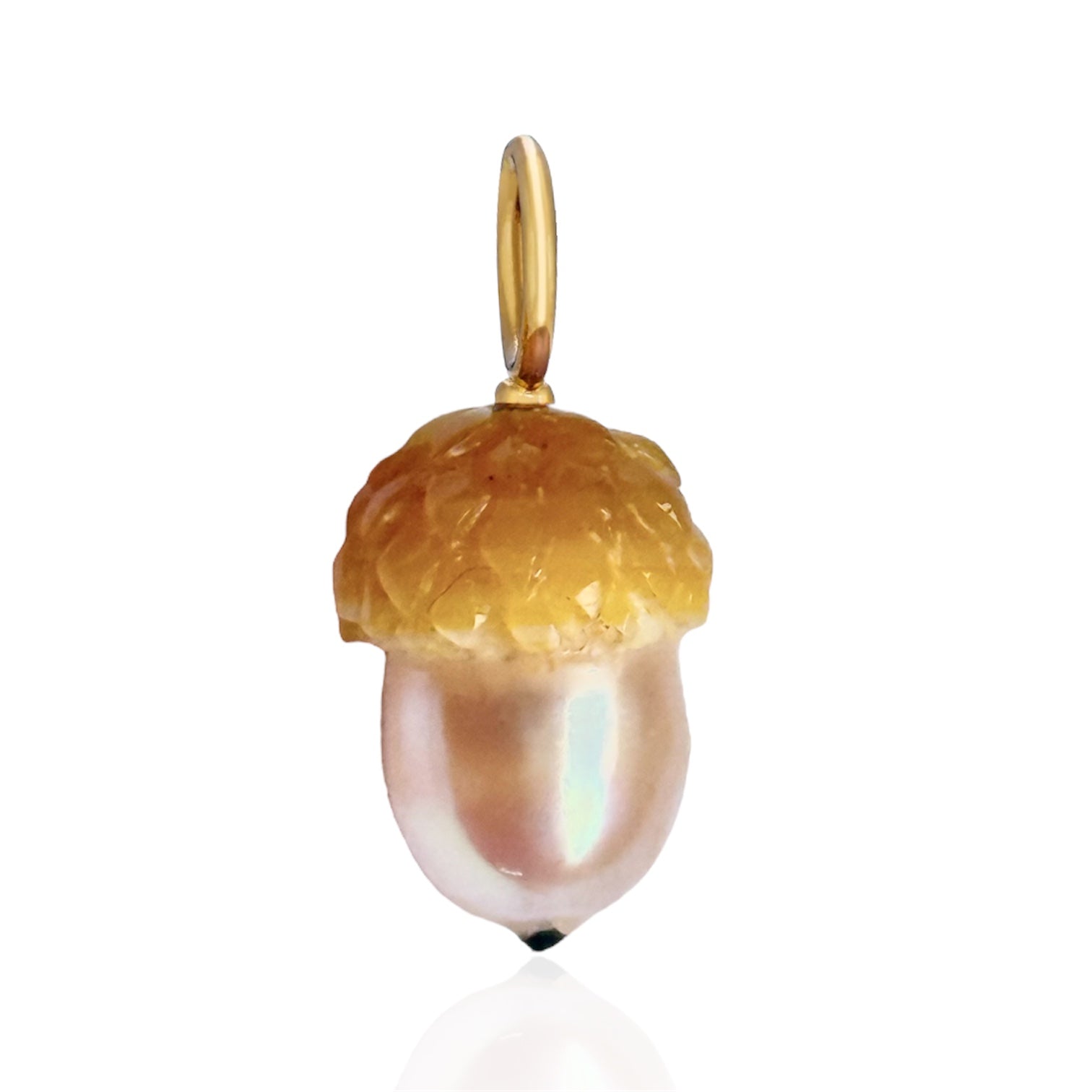 Pearl acorn pendant with gold cap on a white background