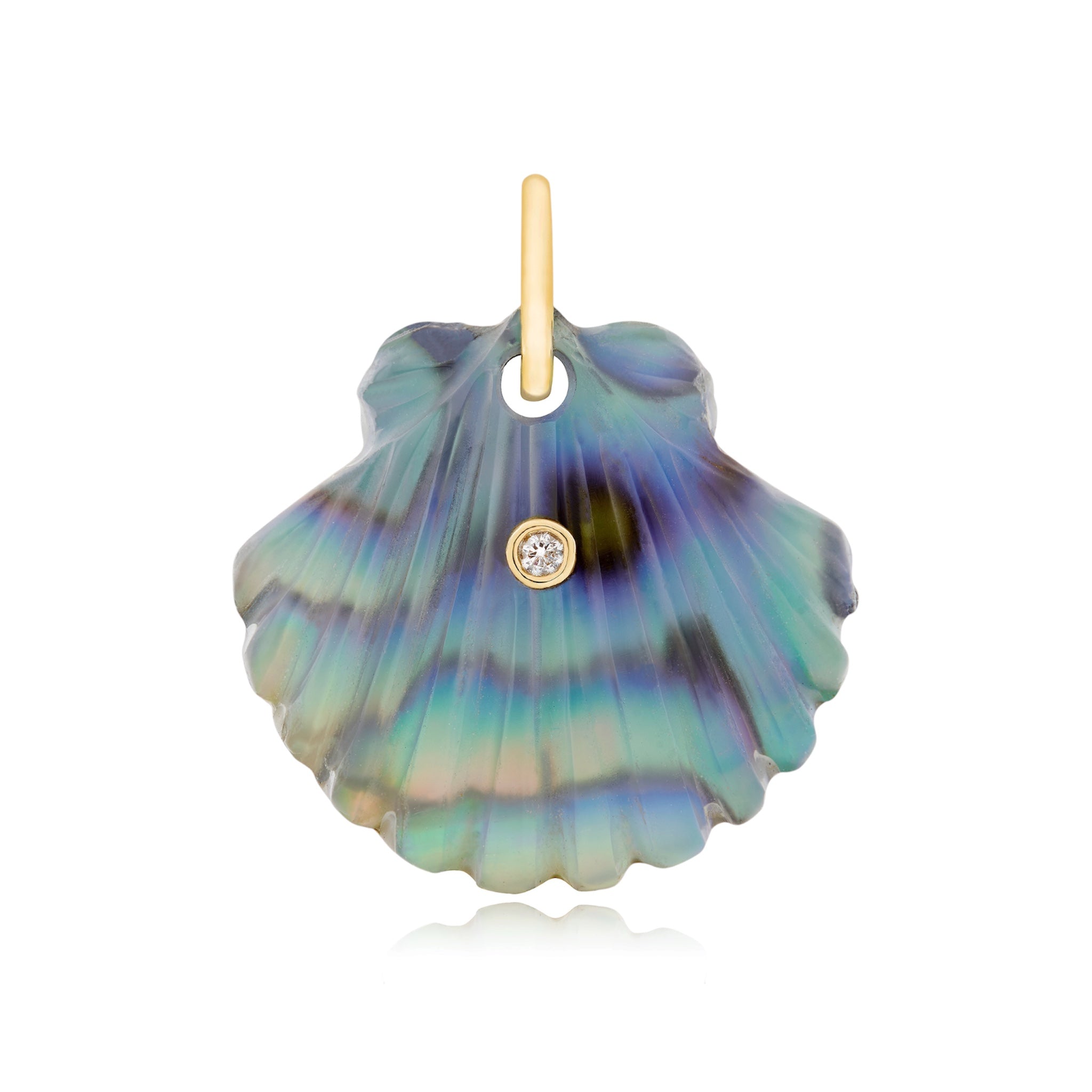 A scallop shell shaped charm in wavy blue, green and purple hues with a diamond in it's center and a 14K yellow gold bail hand carved from abalone. Designed by Maura Green
