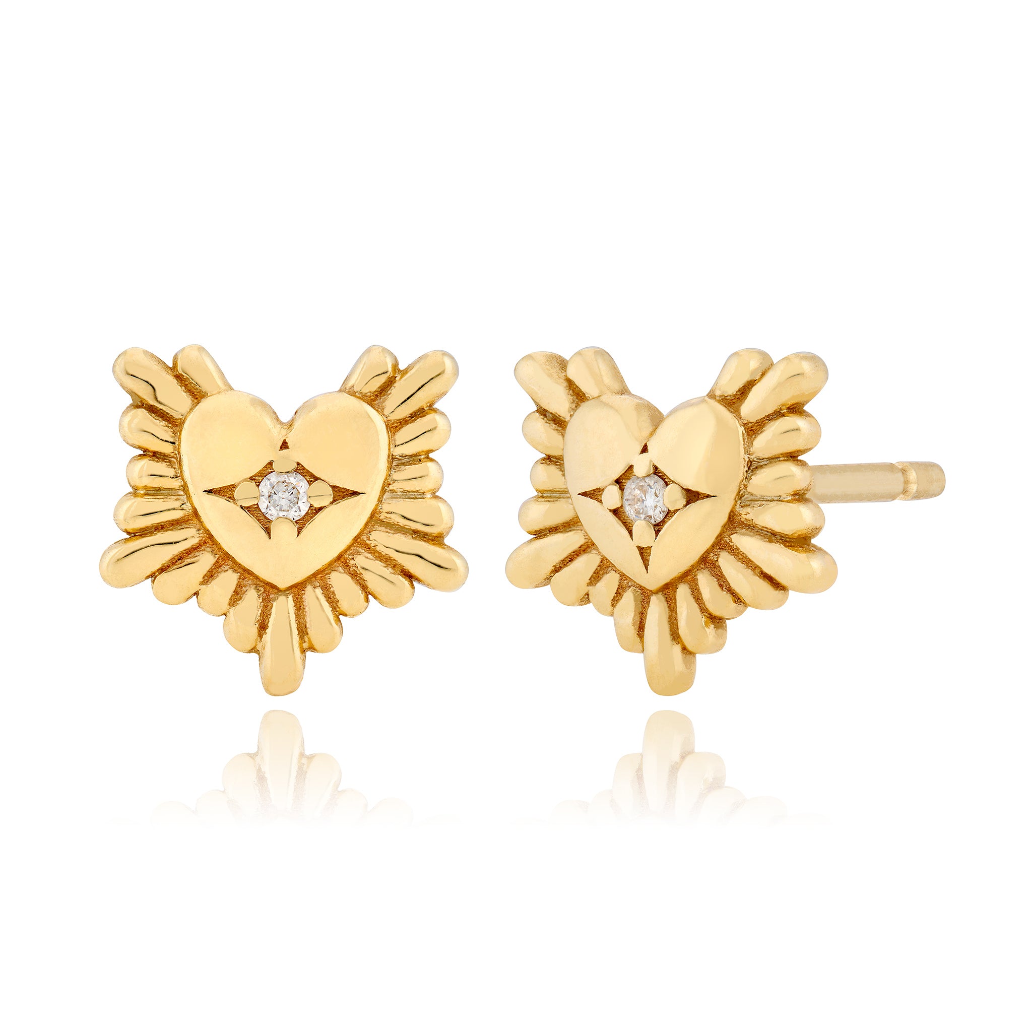 Gold heart-shaped earrings with diamond centers on a white background designed by maura green