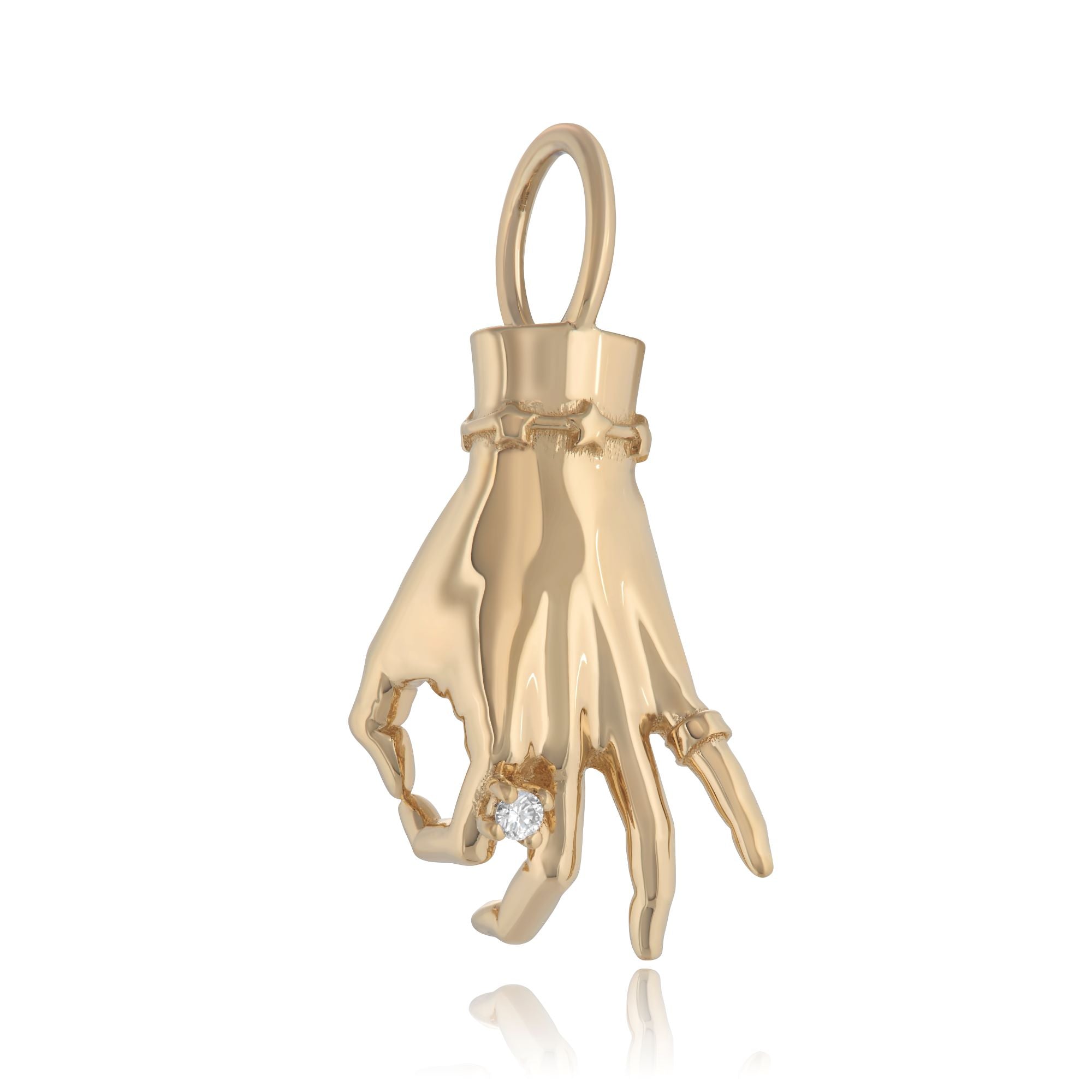 A 14k gold ladyfinger charm with a diamond ring on the index finger, attached to a delicate gold chain. Designed by Maura Green