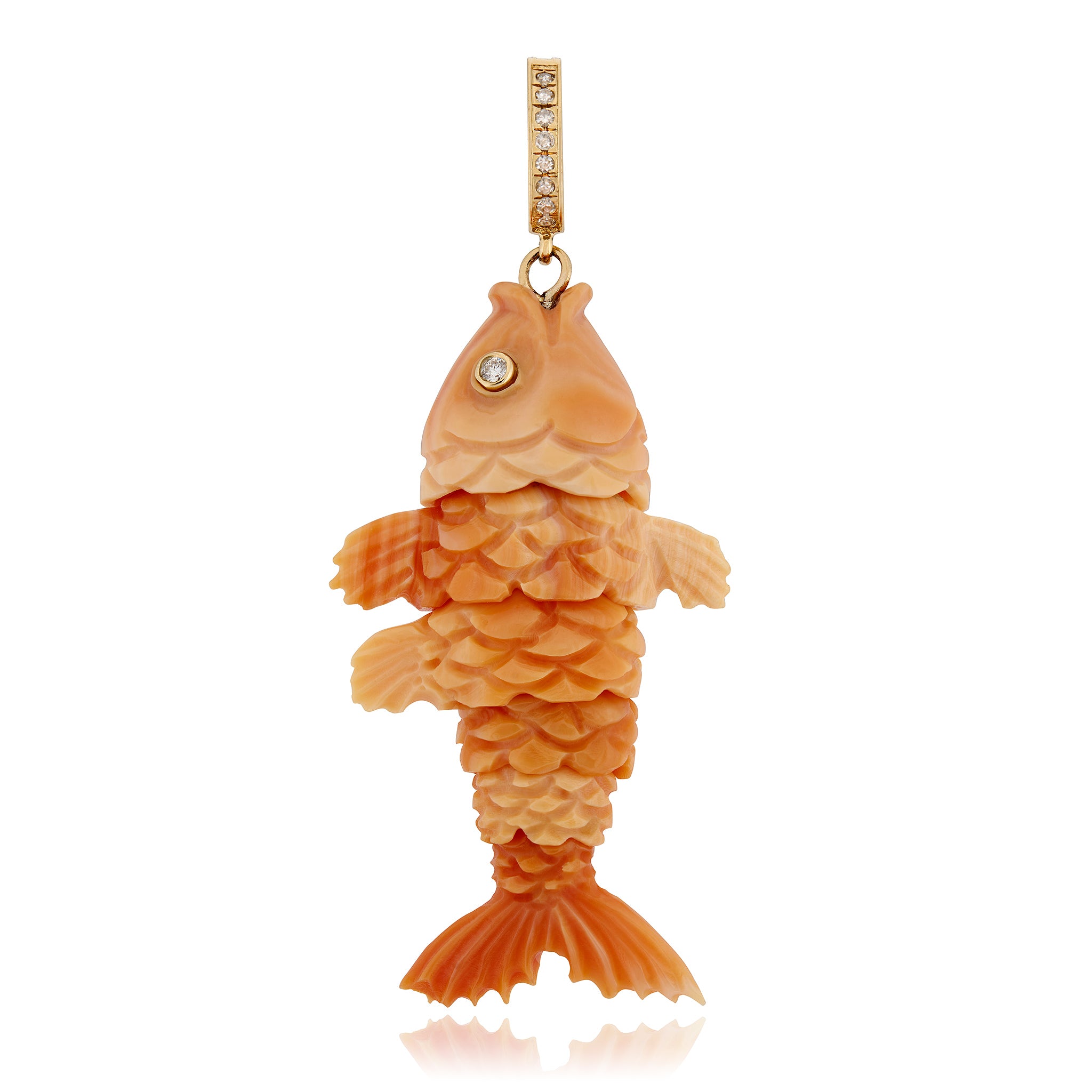 Carved conch shell fish-shaped pendant with diamonds and 14K gold designed by Maura Green