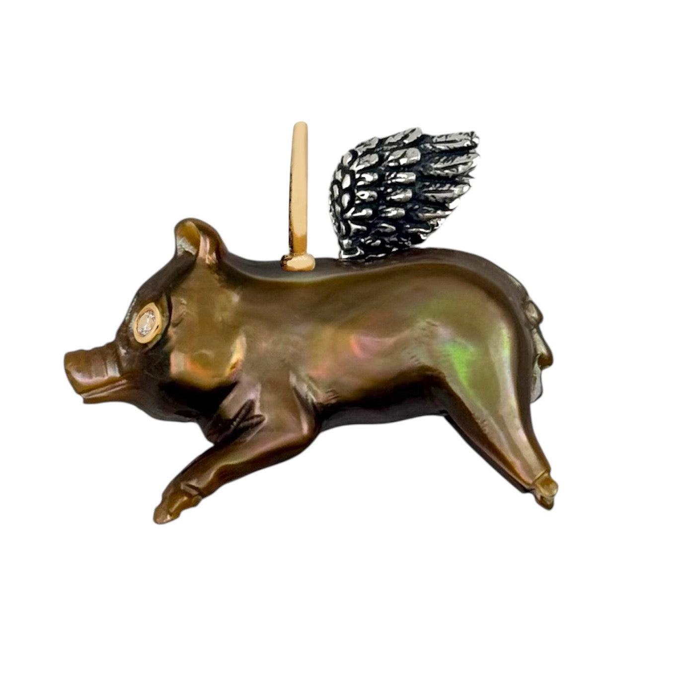 Decorative flying pig charm with a gold, diamonds, and silver wings designed by Maura Green