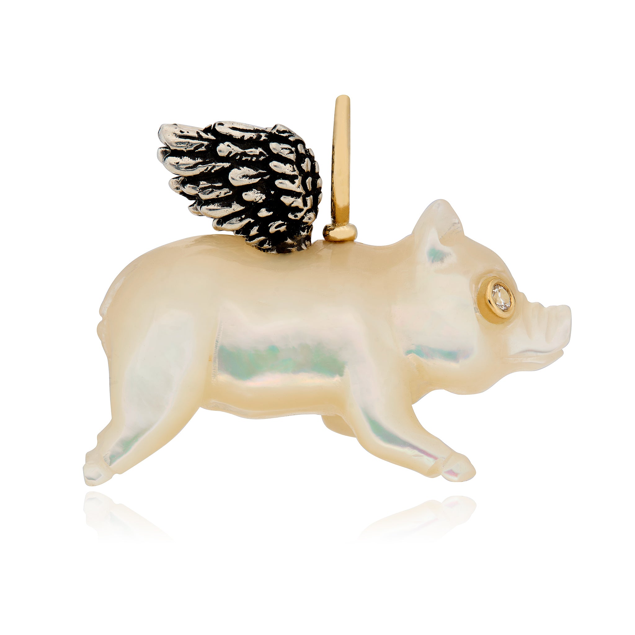Whimsical flying pig charm in white mother of pearl with silver angel wings on a white background