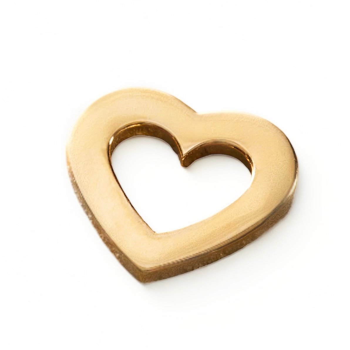 A solid gold heart-shaped charm or slider for necklaces designed by Maura green