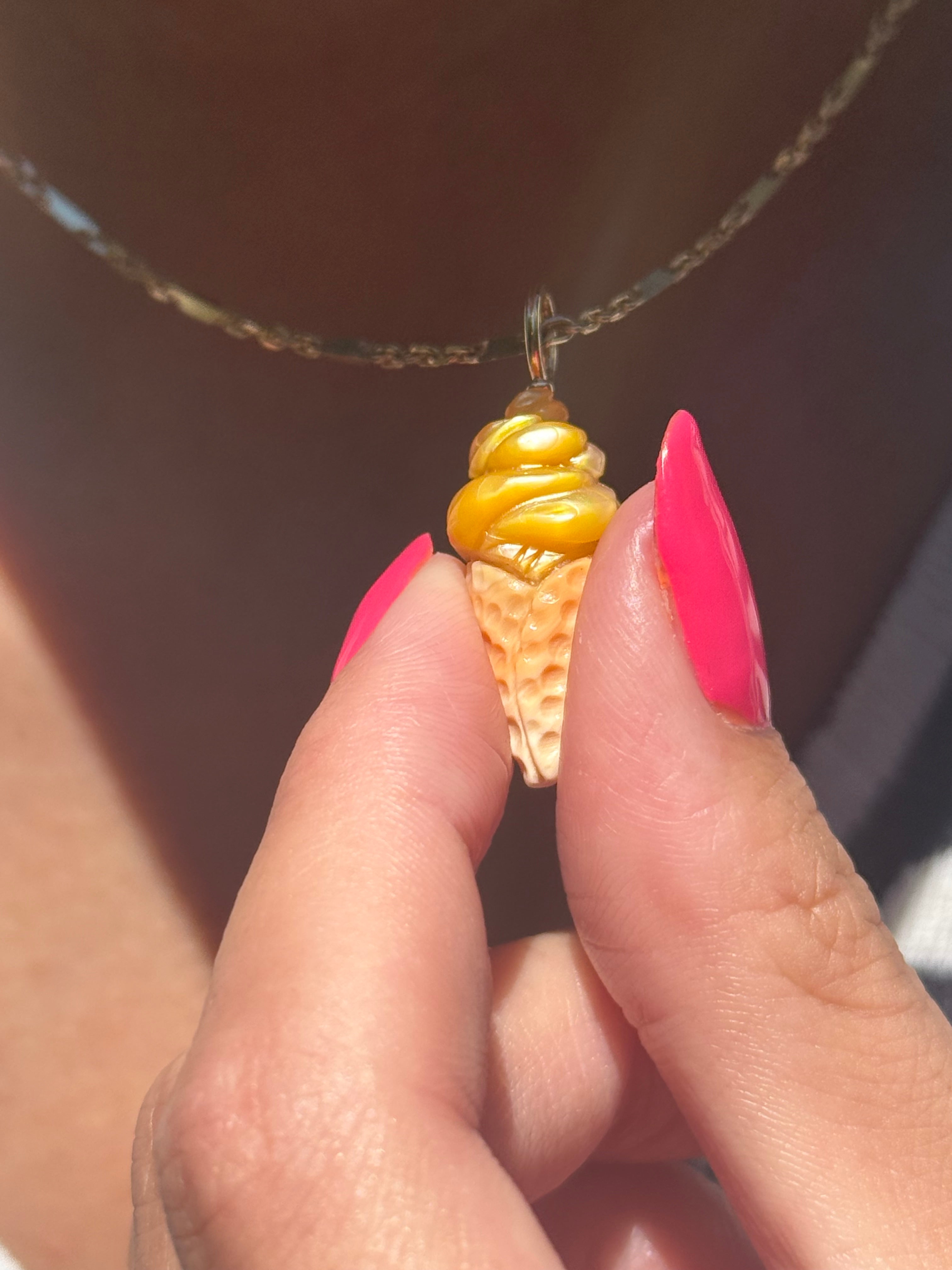 Golden Ice Cream Cone Charm on a gold chain worn by model. Designed by maura green 