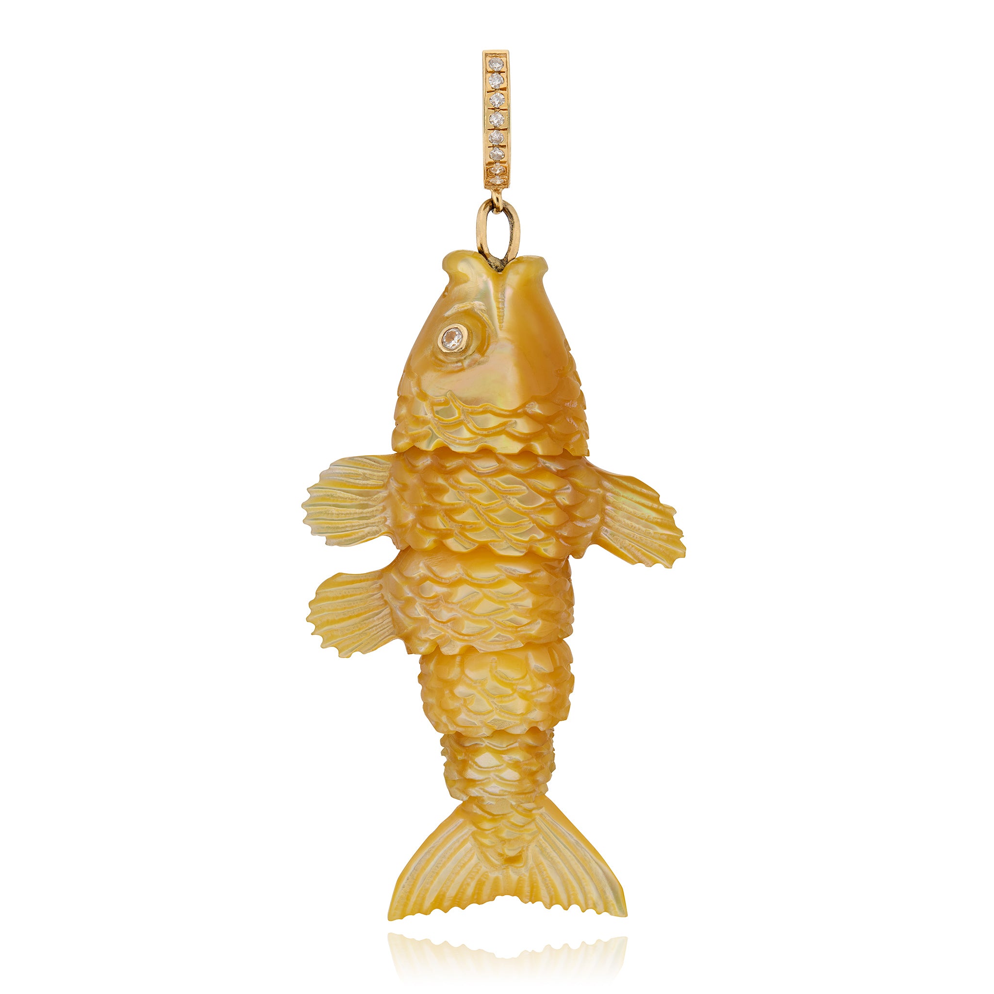 Gold fish-shaped charm designed by Maura Green