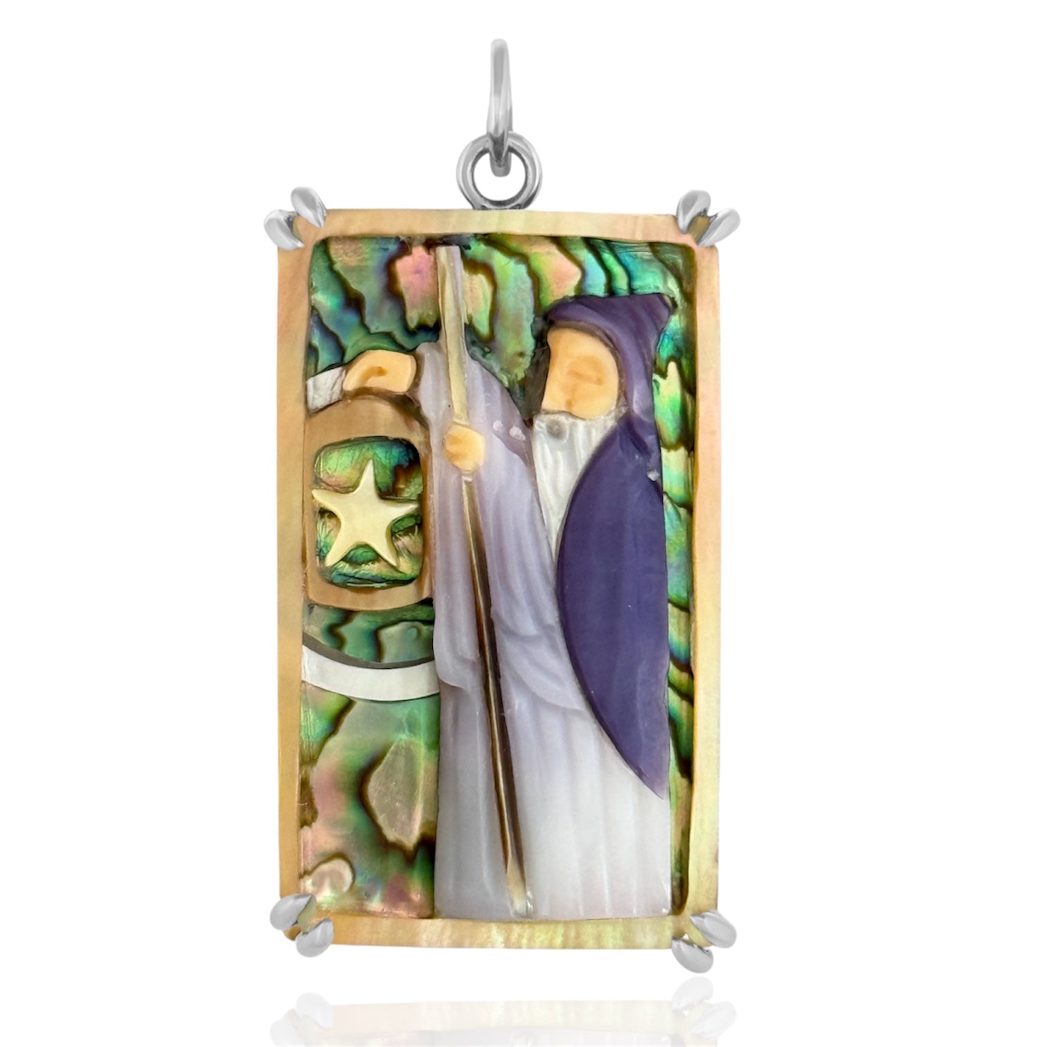 Maura Green Jewelry hand carved hermit tarot charm in silver featuring a hooded hermit holding a walking staff and a lantern.
