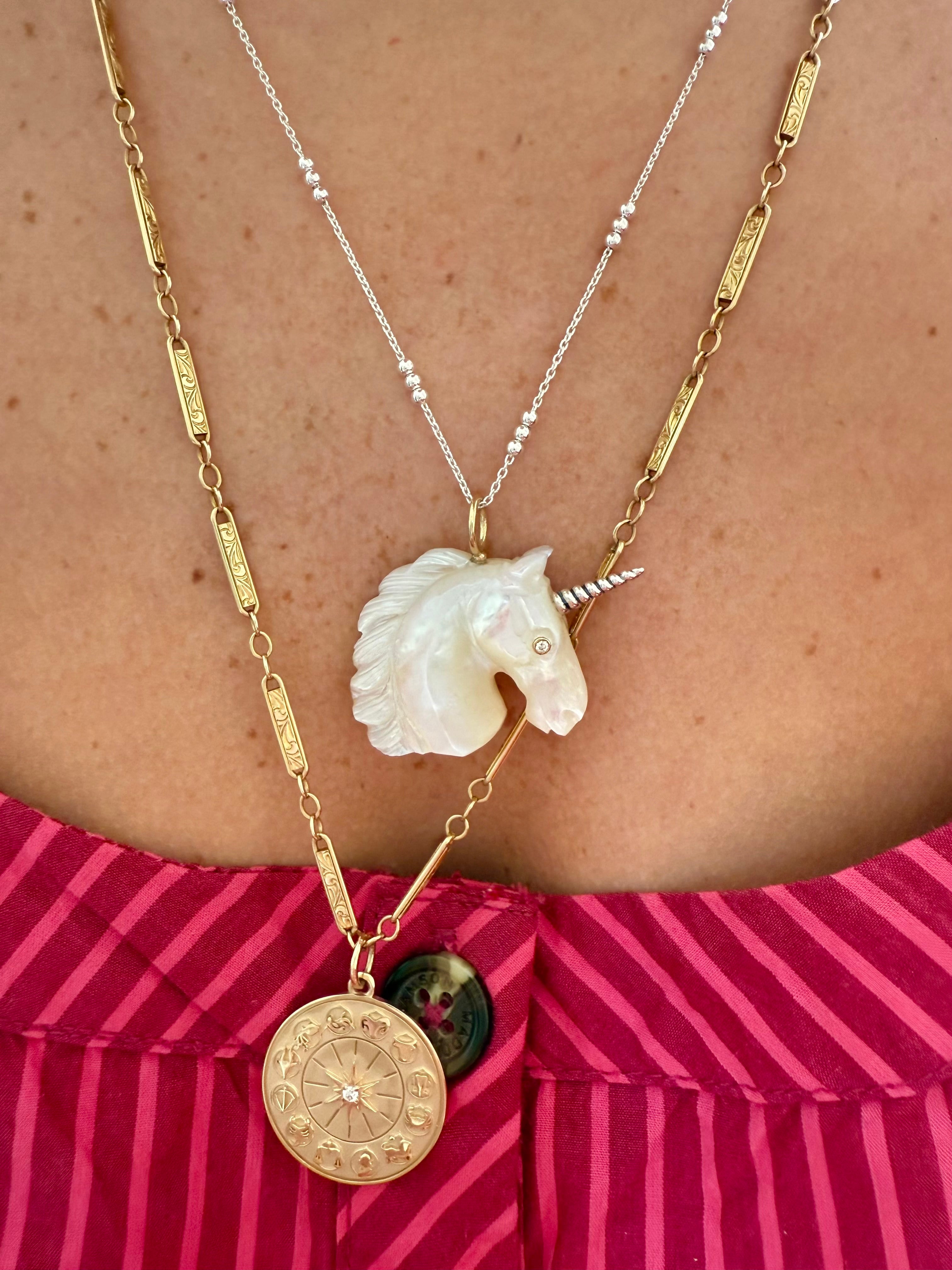 Unicorn in Gold and Mother of Pearl with Silver Horn