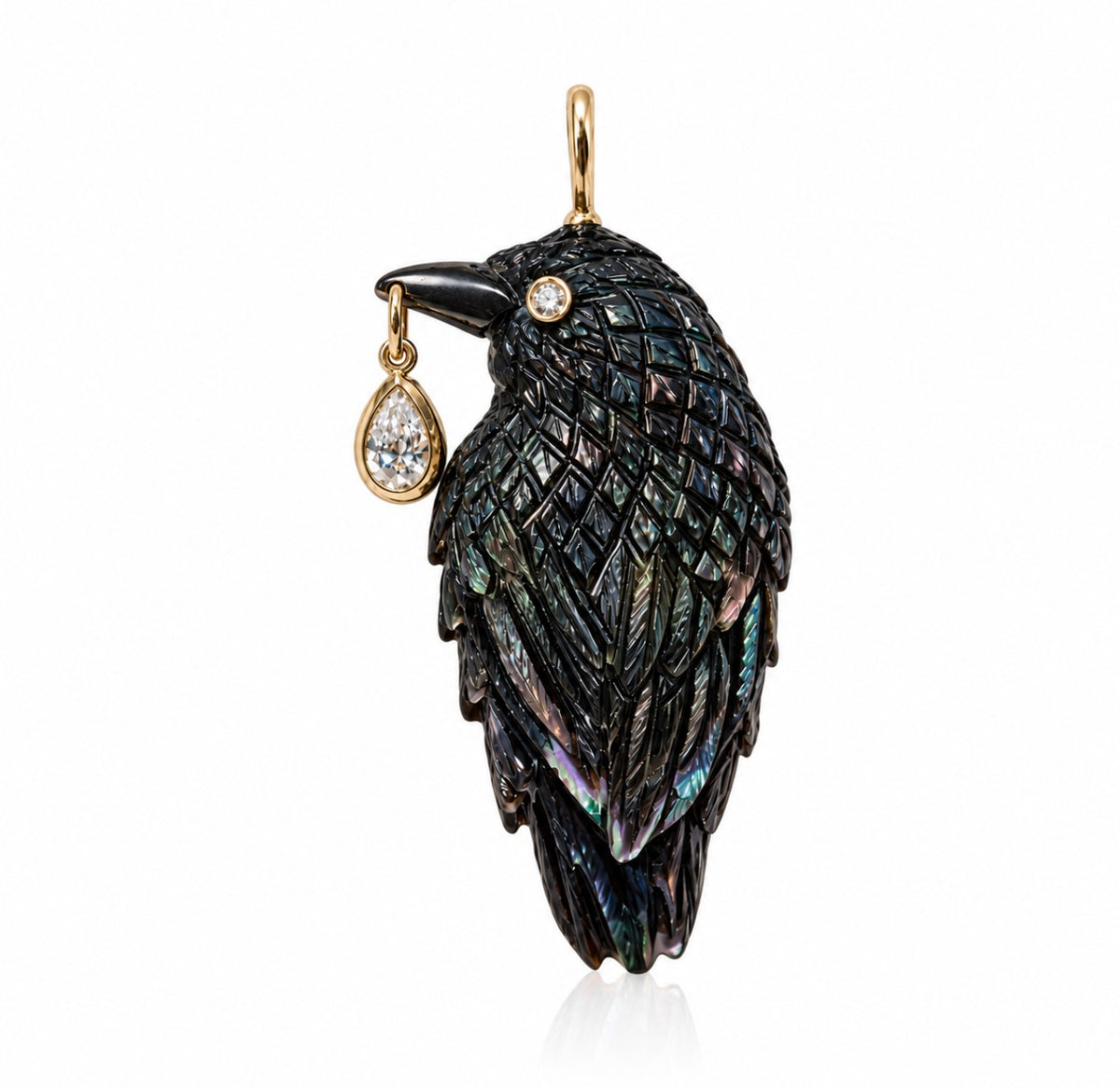 A raven or crow pendant featuring iridescent black and green abalone shell feathers, a gold beak and eye, and a dangling teardrop-shaped diamond, shown on a white background. Designed by Maura Green