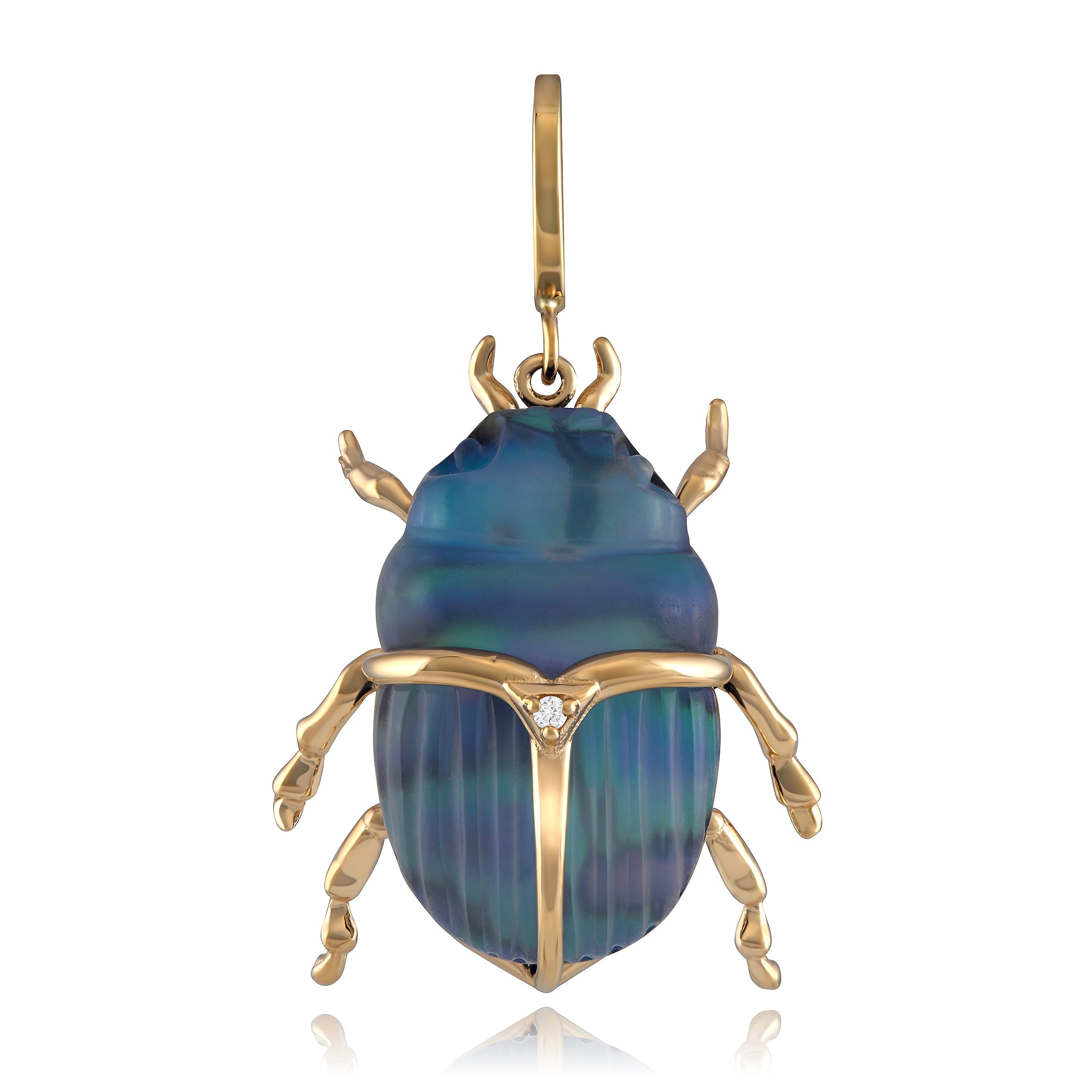 A Maura Green luminescent scarab beetle charm with a combination of blue and green colors, set in a gold frame with a diamond accent.