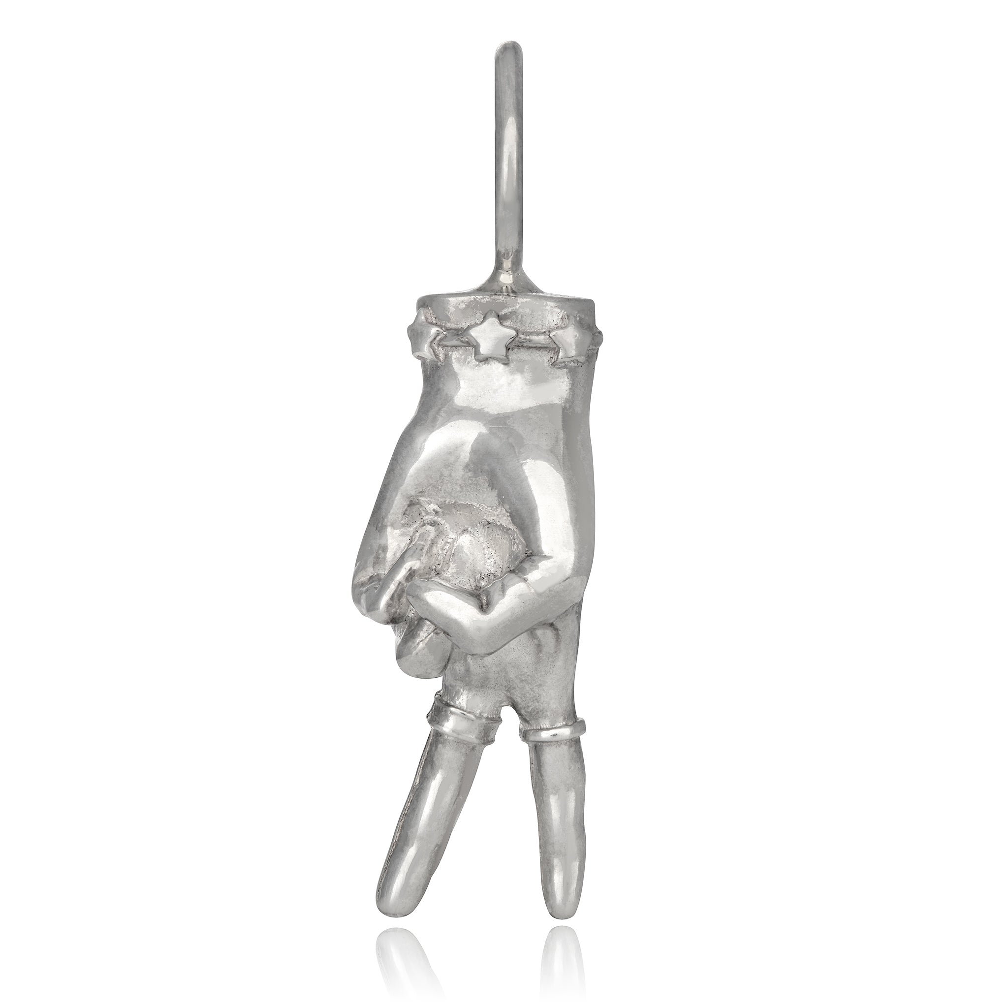 A sterling silver charm in the shape of a hand wearing a bracelet and rings and making a peace sign from Maura Green Jewelry's Ladyfinger collection.