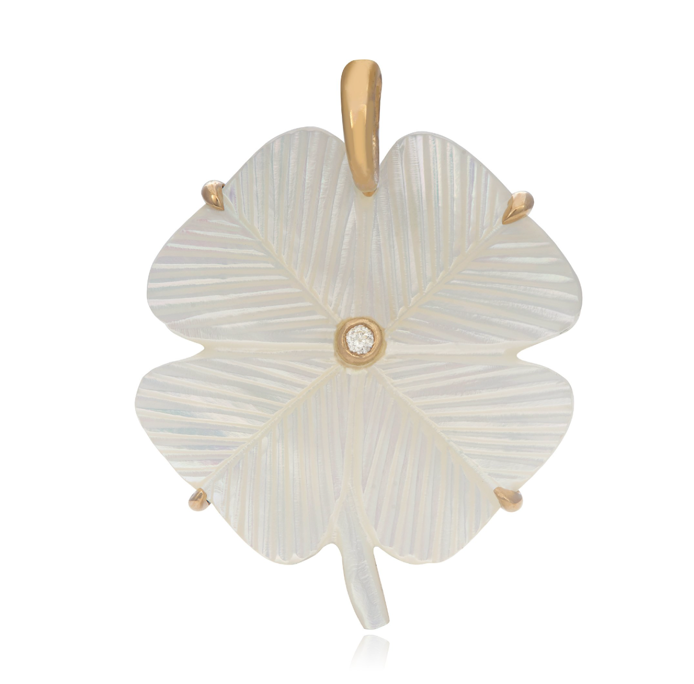 A hand-carved white mother of pearl clover charm with a diamond inlay in the center, set in 14K solid gold designed by Muara Green