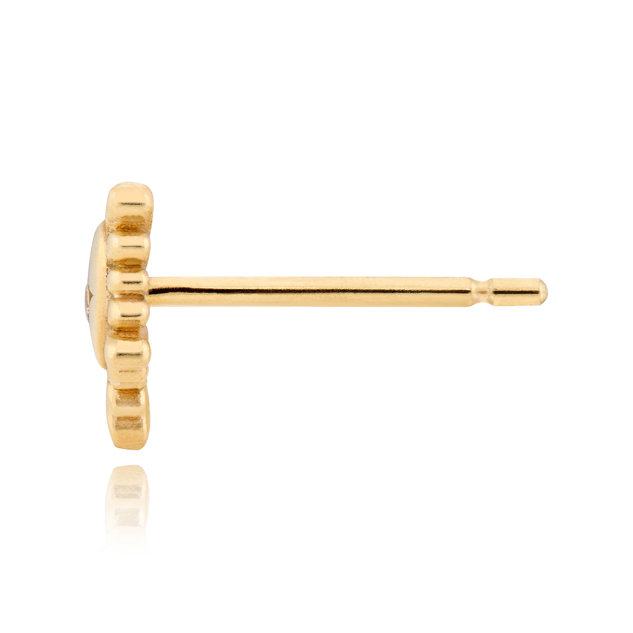 Side view of Gold heart-shaped earrings with diamond centers on a white background designed by maura green