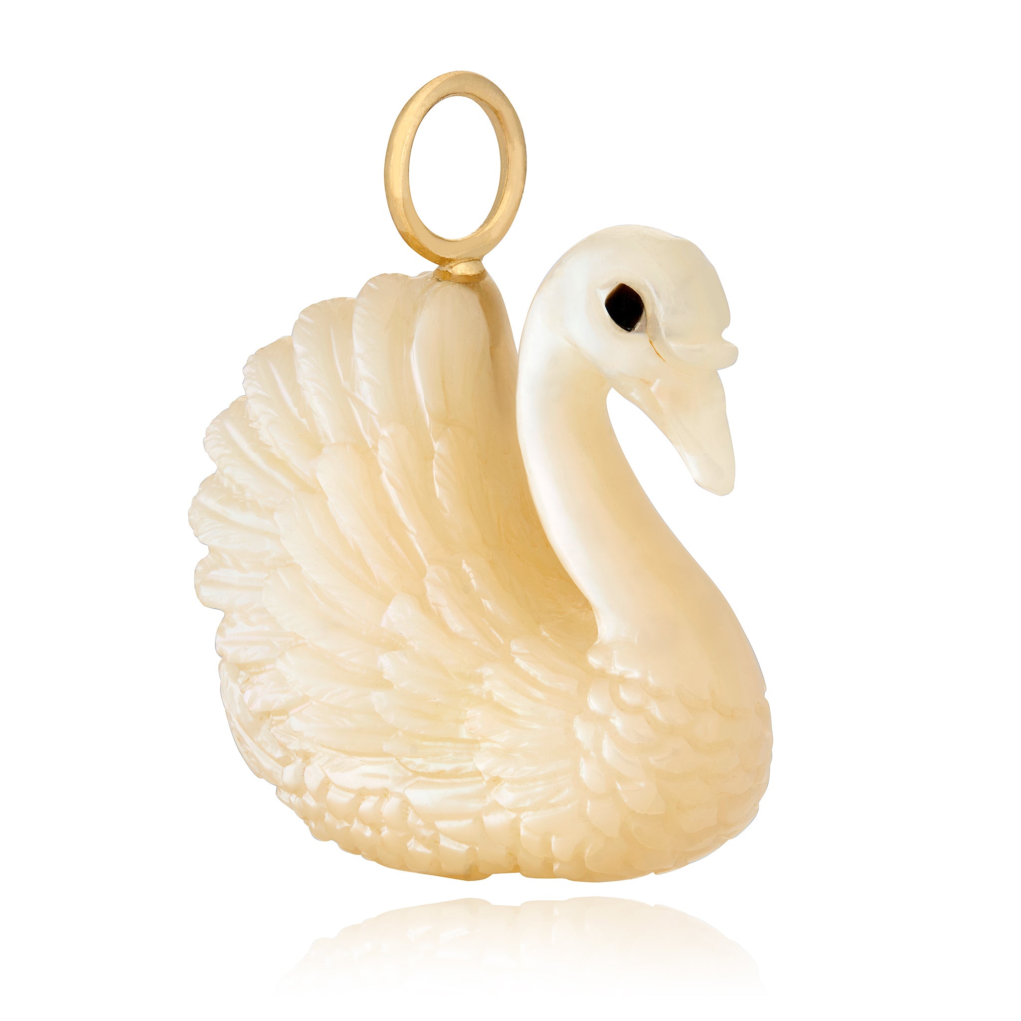 Carved white mother of pearl swan-shaped charm with a yellow gold bail on a white background designed by Maura Green Jewelry.