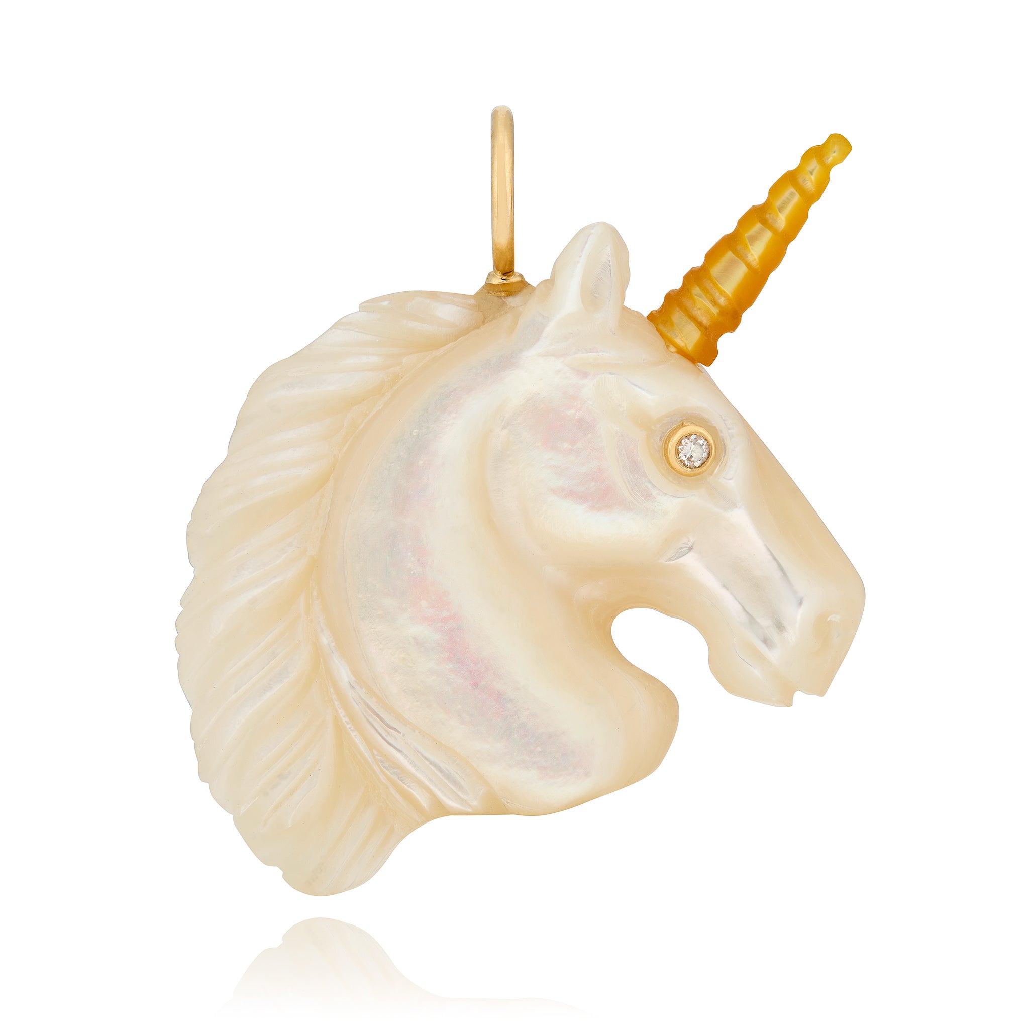 White mother of pearl unicorn head charm with a gold horn on a white background
