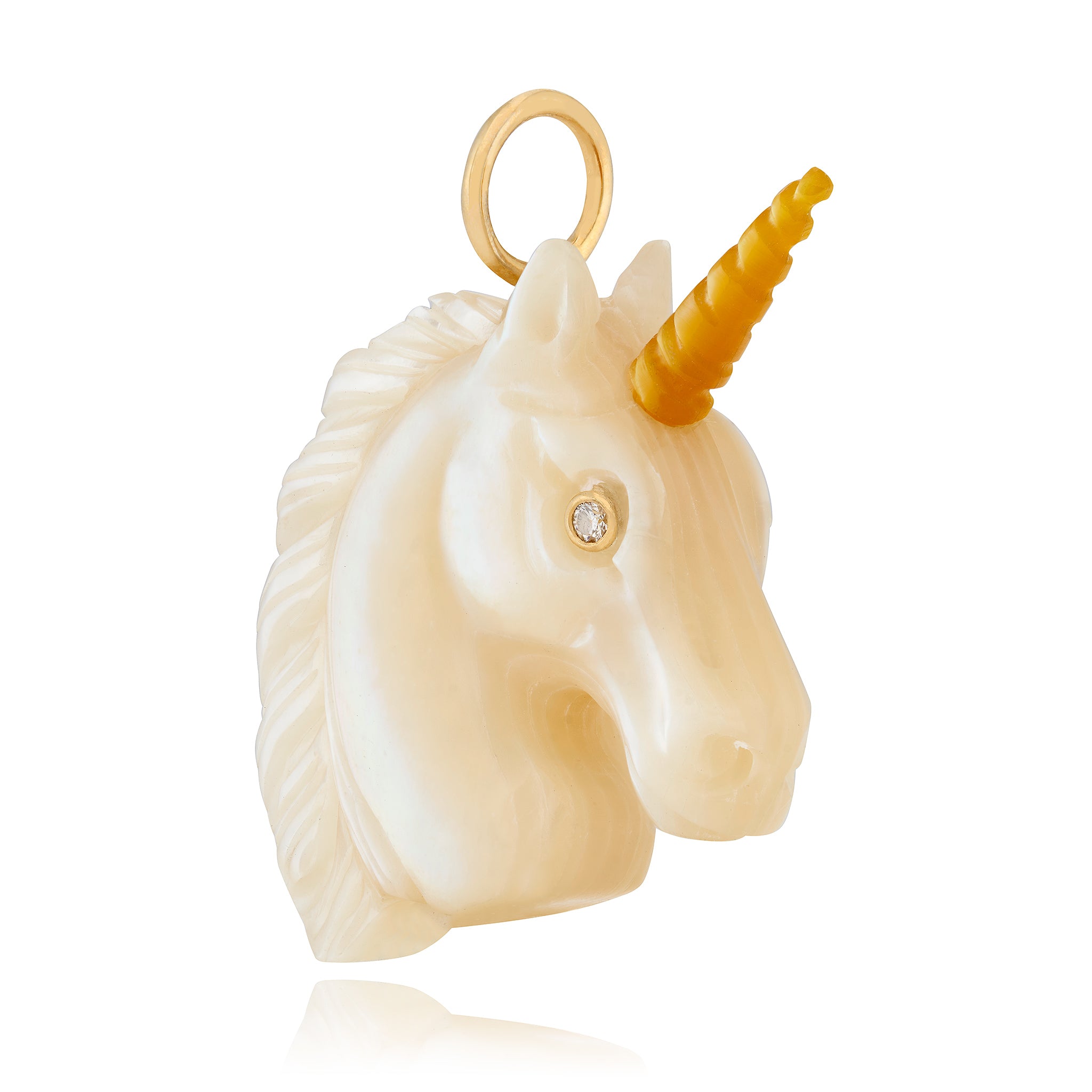 Unicorn head pendant with a gold horn on a white background
