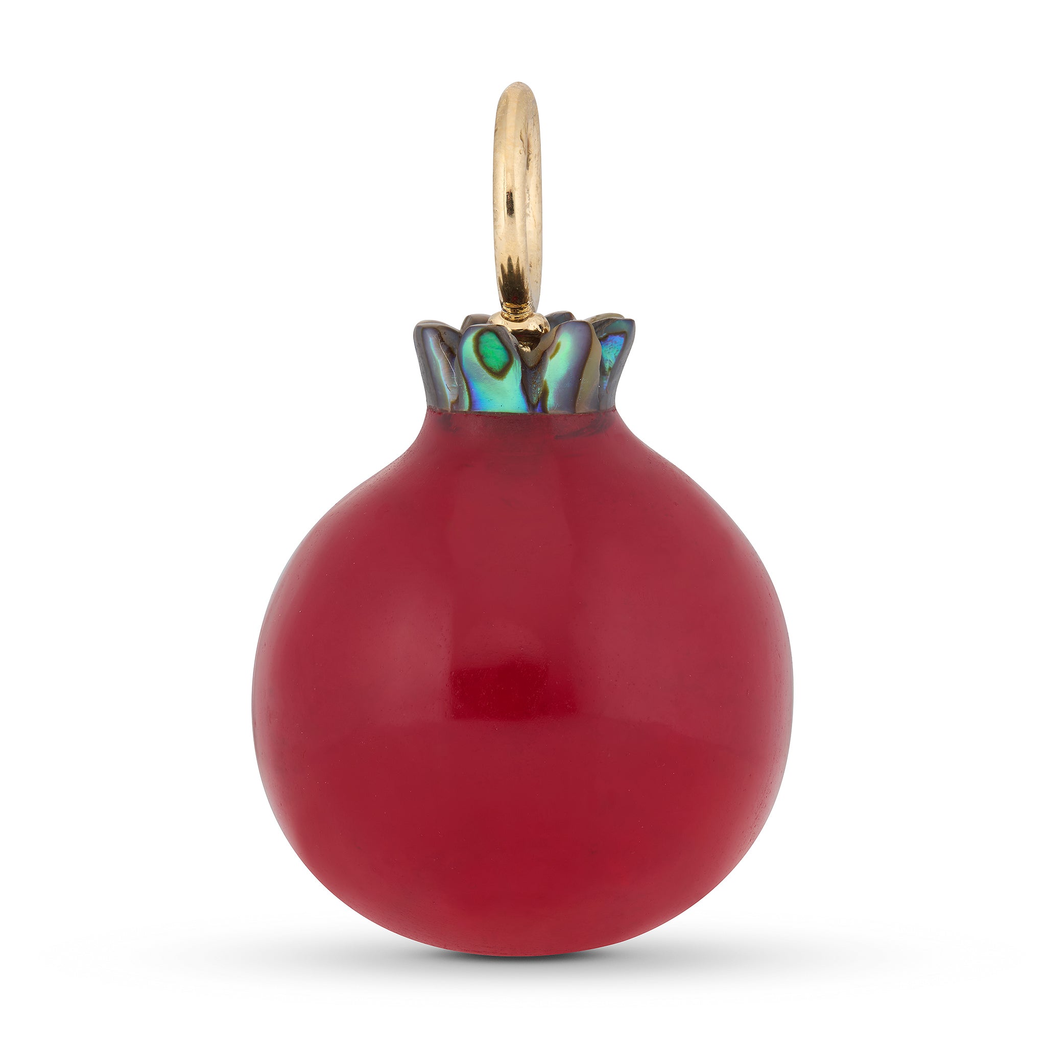 Back view of a red pomegranate charm with gold and abalone shell top and a white beail on a white background