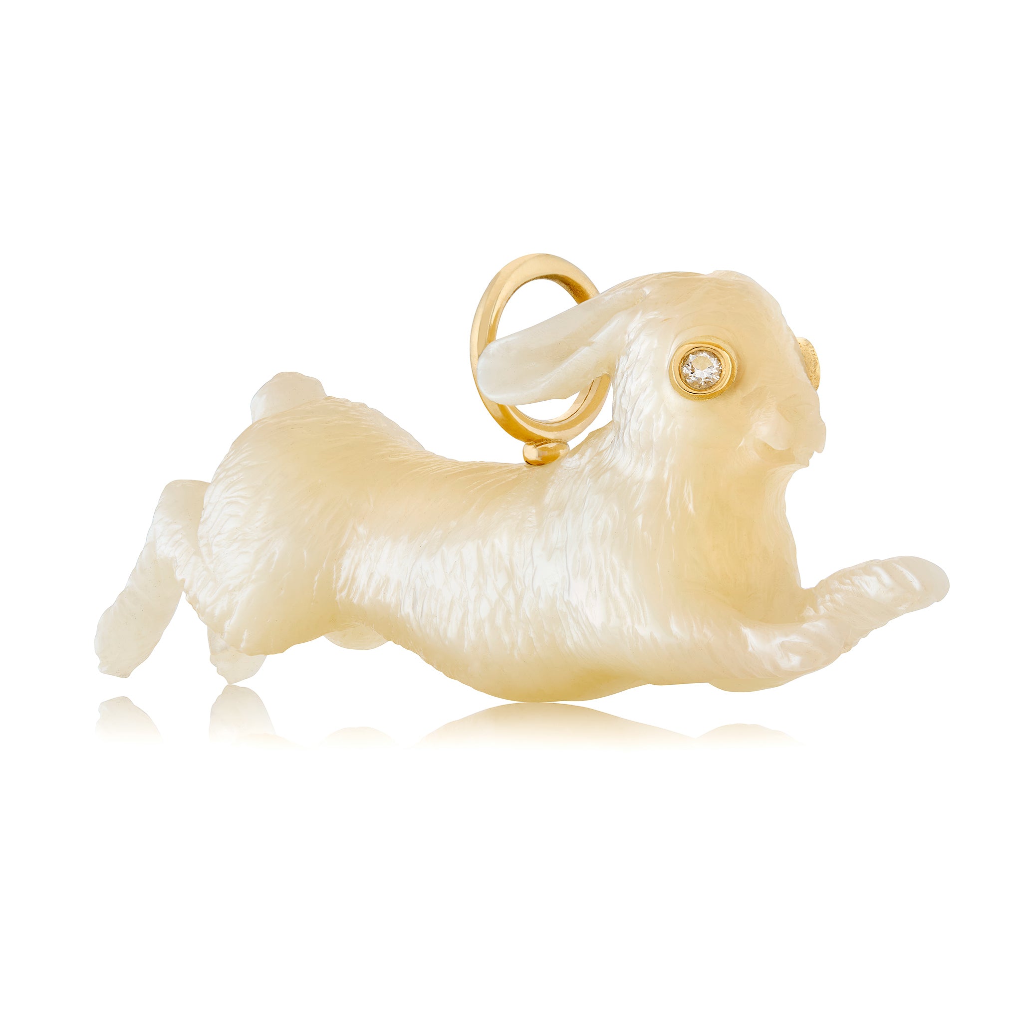 White mother of pearl leaping rabbit-shaped pendant on a white background. Designed by Maura Green