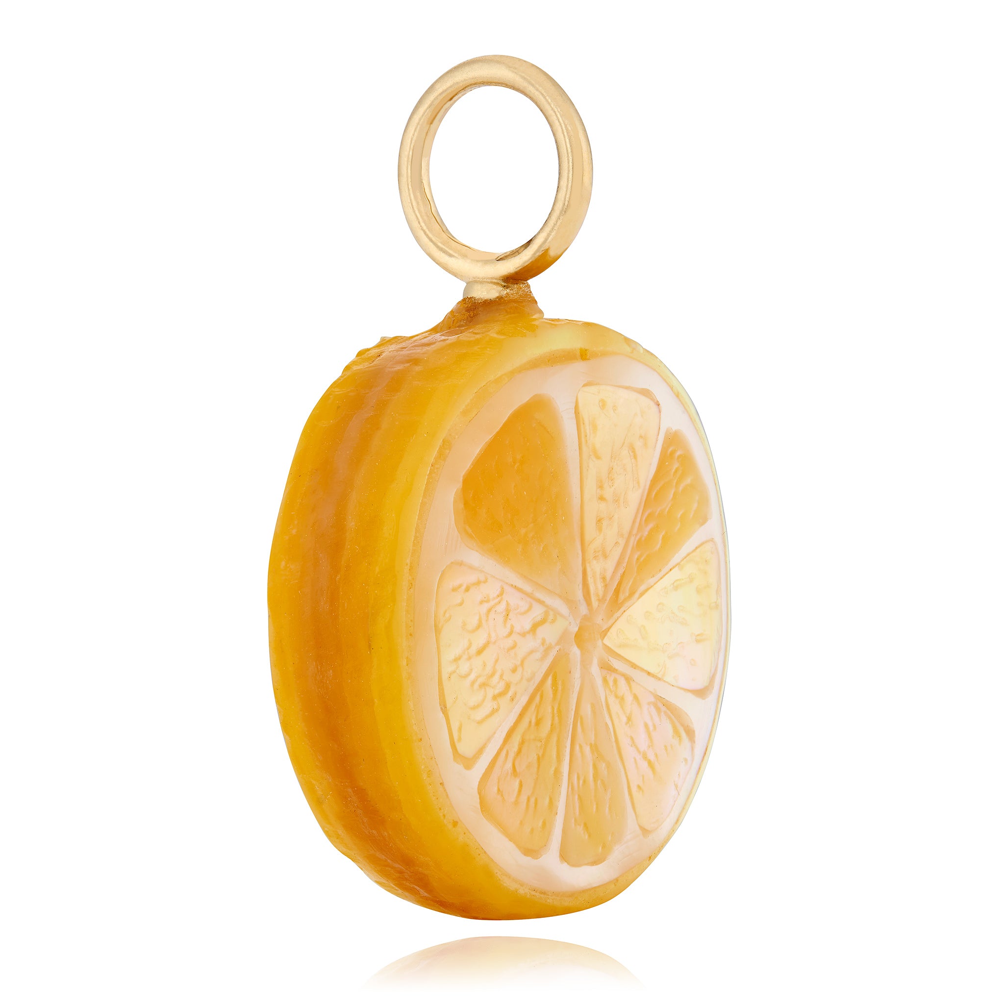 Lemon-shaped pendant with gold ring on a white background. Designed by Maura Green