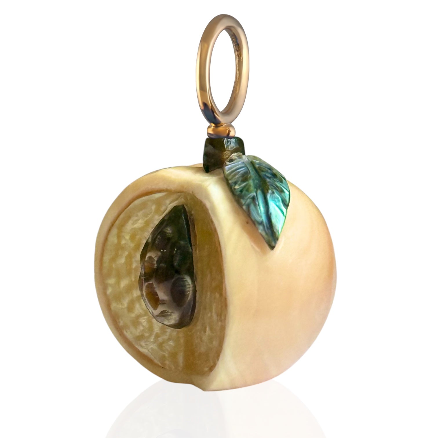Peach charm on a 14K gold bail with a white background designed by maura green